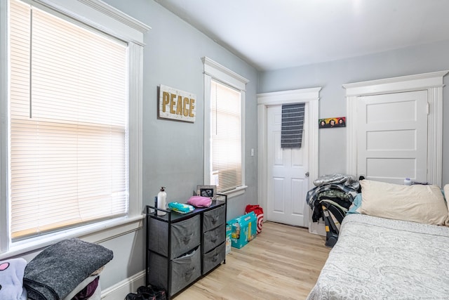 bedroom featuring light wood finished floors