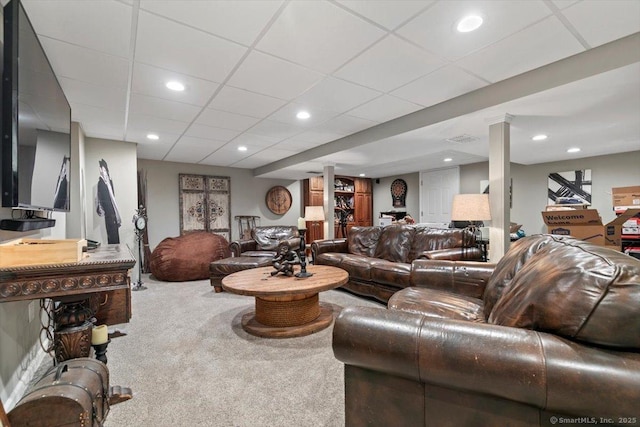 living room with a paneled ceiling, carpet flooring, visible vents, and recessed lighting