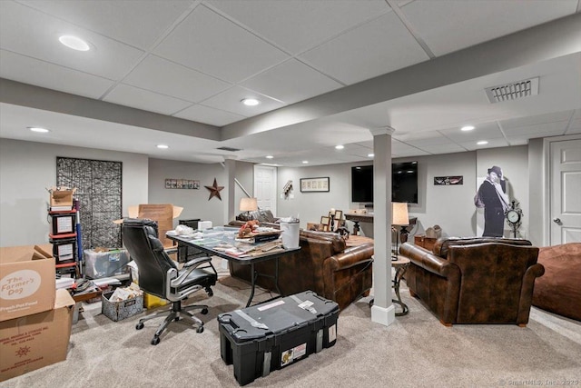 carpeted office space featuring a drop ceiling, visible vents, and recessed lighting