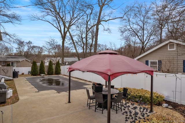 view of patio / terrace with a fenced backyard and outdoor dining area