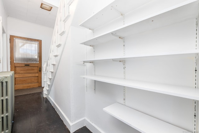 pantry with radiator heating unit