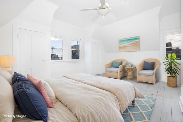 bedroom with wood finished floors and a ceiling fan