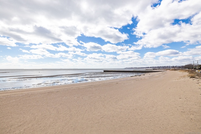 property view of water featuring a beach view