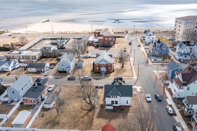 aerial view with a residential view and a beach view