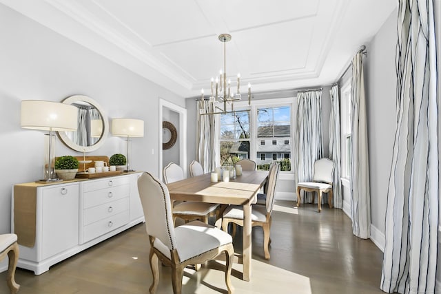 dining area with baseboards, a tray ceiling, dark wood finished floors, and a notable chandelier