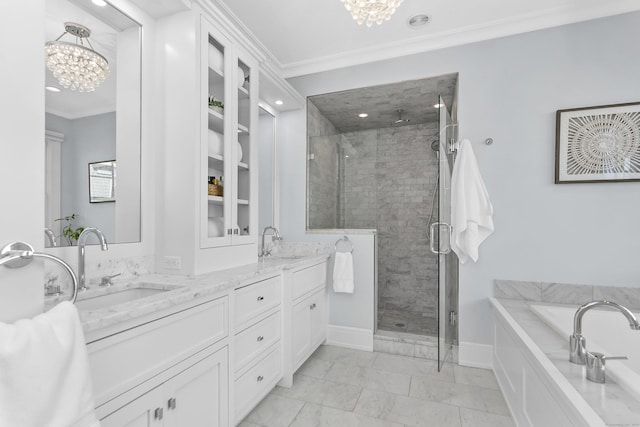 bathroom featuring crown molding, a stall shower, a sink, and a notable chandelier