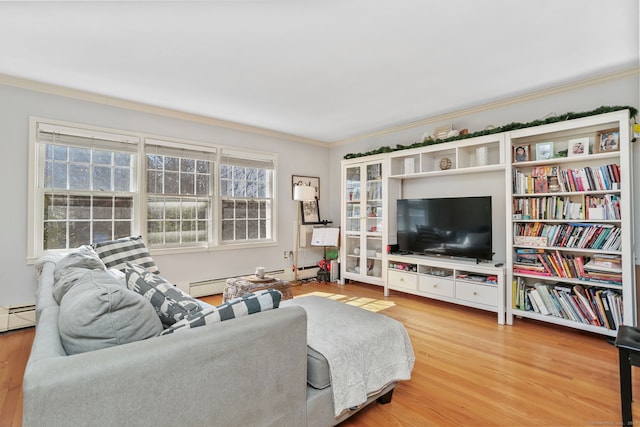 living area with wood finished floors, a baseboard radiator, and ornamental molding