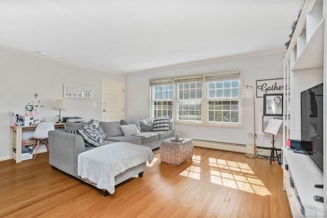 living room with crown molding, light wood-type flooring, and baseboards