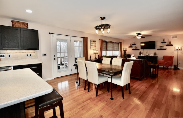 dining space featuring visible vents, baseboards, a ceiling fan, light wood-style flooring, and recessed lighting