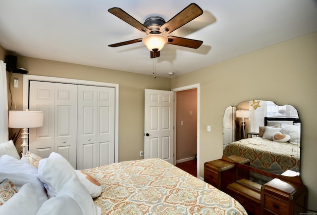 bedroom with a closet and a ceiling fan