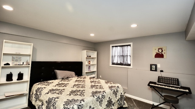 bedroom with baseboards, dark colored carpet, and recessed lighting