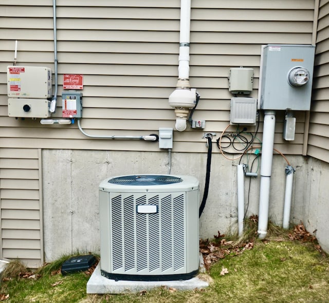 details with electric meter and central AC unit