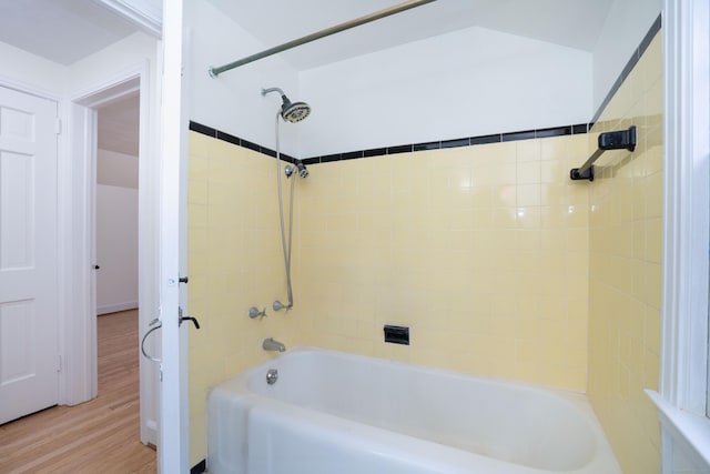 full bathroom with wood finished floors and shower / bathing tub combination