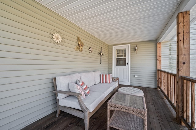 wooden terrace featuring outdoor lounge area