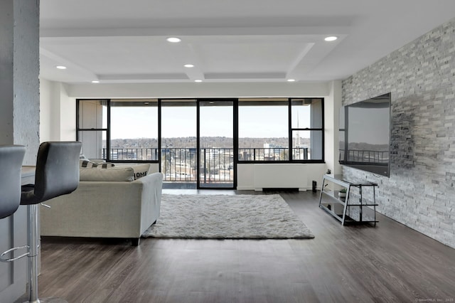 living room featuring wood finished floors and recessed lighting