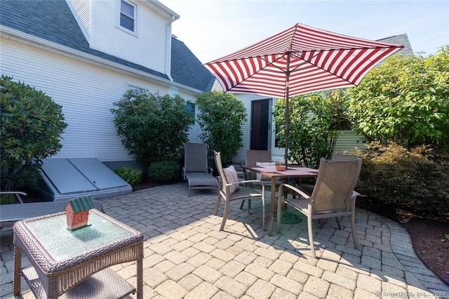 view of patio with outdoor dining area