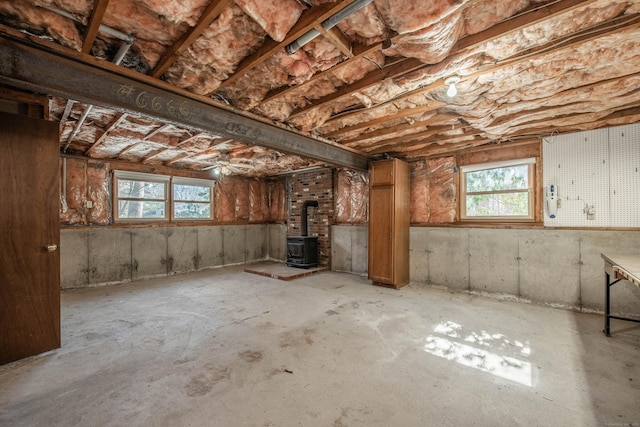 basement featuring a wood stove