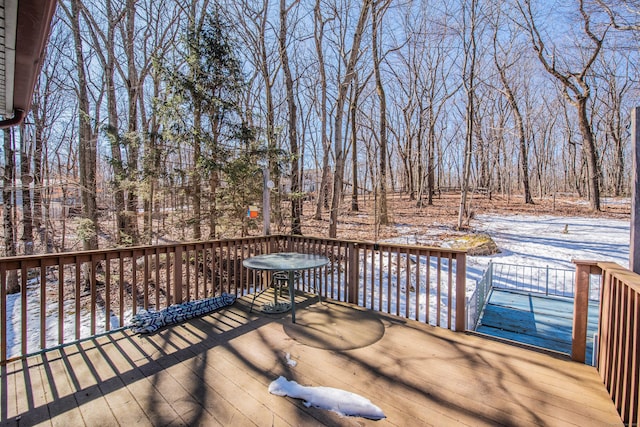 view of snow covered deck