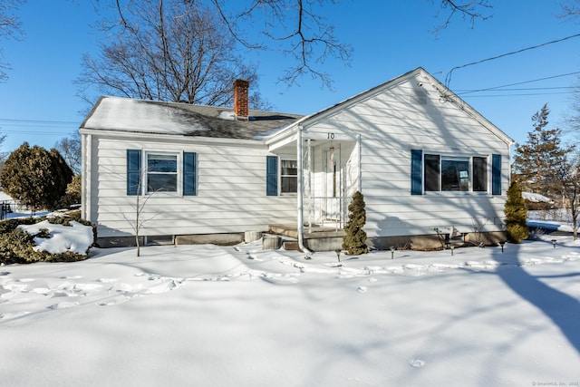 view of front of home with a chimney