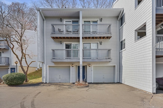 view of front of property featuring driveway and an attached garage