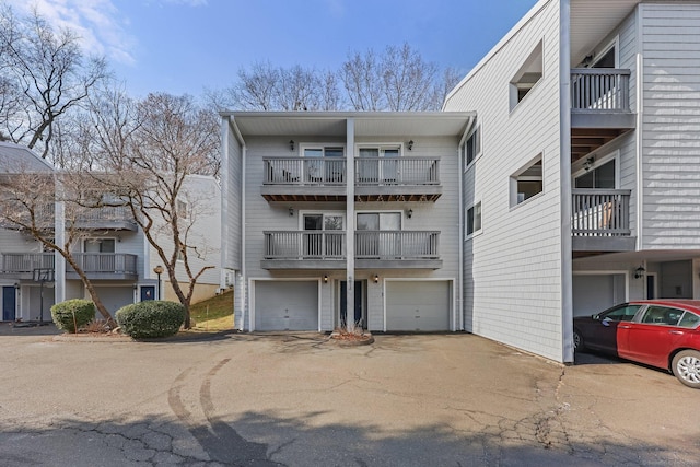 exterior space with driveway and an attached garage