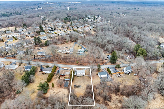 birds eye view of property with a residential view