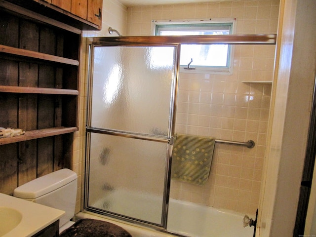 14 Sycamore St, Norwalk, CT 06855 - full bathroom featuring bath / shower combo with glass door, toilet, and vanity