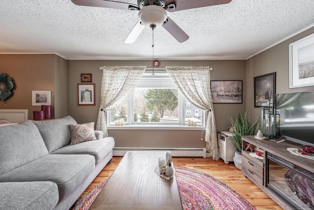 living room with a textured ceiling, light wood-style floors, a baseboard radiator, and crown molding