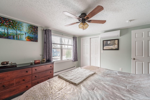 bedroom featuring a textured ceiling, a wall mounted AC, a baseboard radiator, and a closet