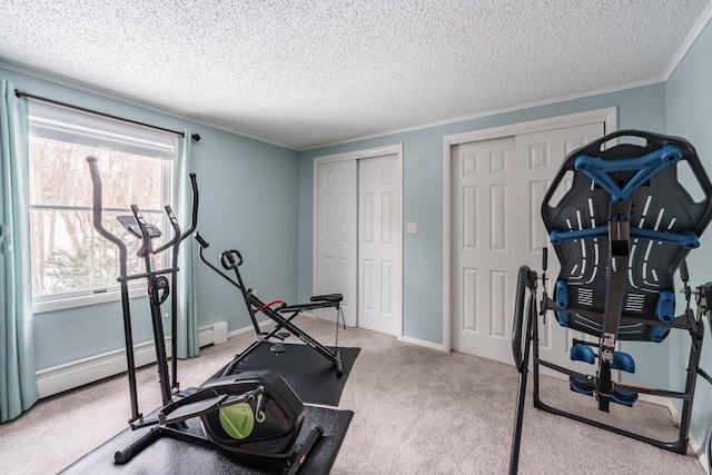 exercise area with ornamental molding, a baseboard radiator, light carpet, and a textured ceiling