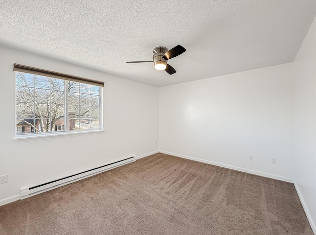 carpeted empty room featuring baseboards, baseboard heating, a textured ceiling, and ceiling fan