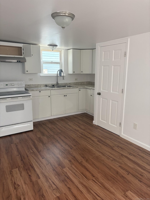 kitchen featuring dark wood-style flooring, a sink, under cabinet range hood, white cabinetry, and white range with electric stovetop