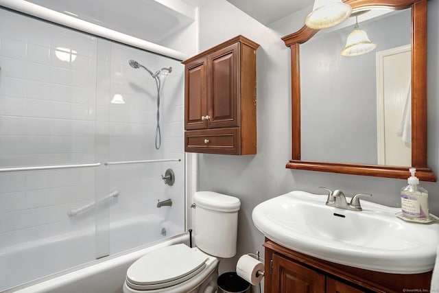 full bath with toilet, combined bath / shower with glass door, and vanity