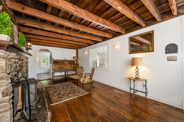 175 Mountain Rd, Wilton, CT 06897 - sitting room featuring a wooden ceiling with exposed beams, arched walkways, and wood-type flooring