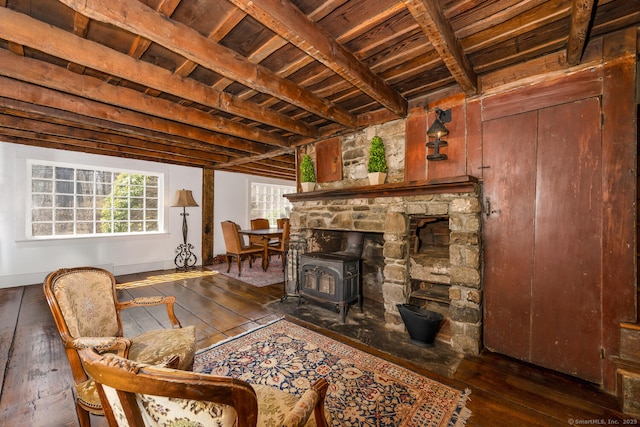 175 Mountain Rd, Wilton, CT 06897 - living room featuring wood-type flooring, a wood stove, and a wooden ceiling with exposed beams
