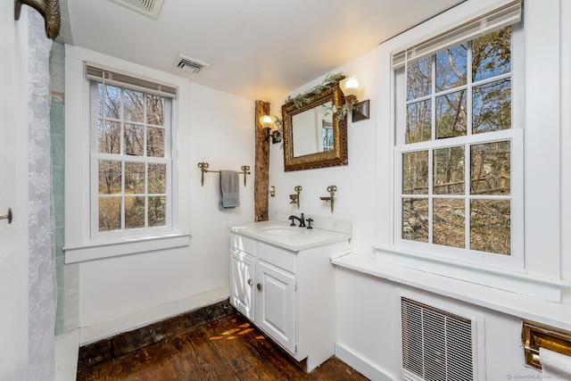 175 Mountain Rd, Wilton, CT 06897 - full bath with vanity, plenty of natural light, and wood finished floors
