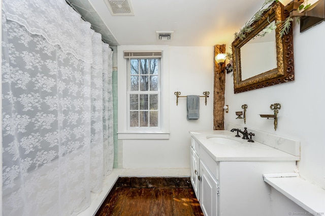 175 Mountain Rd, Wilton, CT 06897 - bathroom with wood finished floors, vanity, and curtained shower