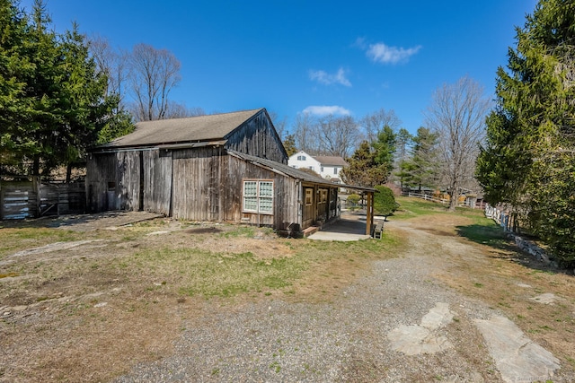 175 Mountain Rd, Wilton, CT 06897 - view of side of property featuring dirt driveway and a barn