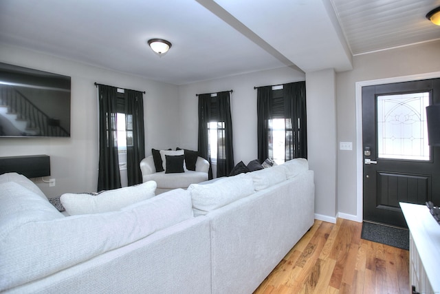 living room with light wood-style floors and baseboards