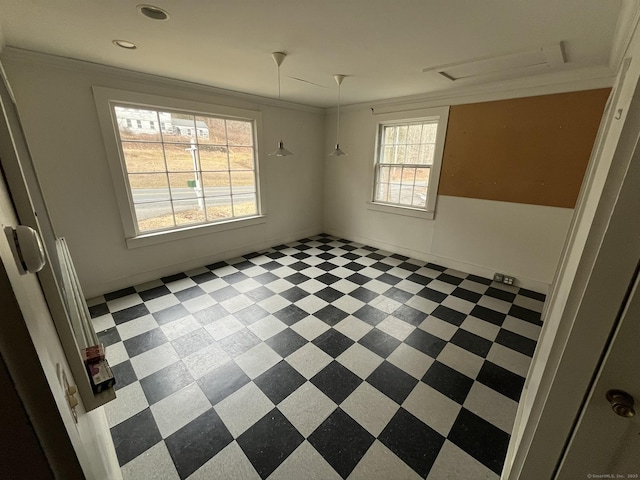 unfurnished room featuring ornamental molding