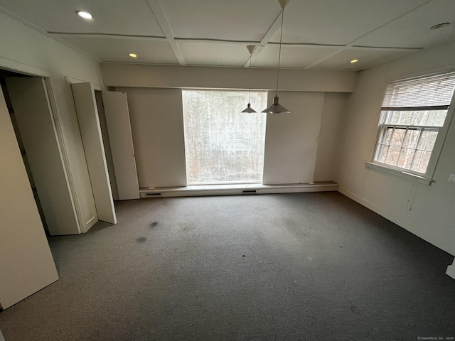 empty room featuring carpet flooring and recessed lighting