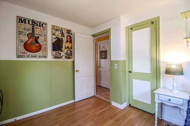 unfurnished bedroom with light wood-type flooring