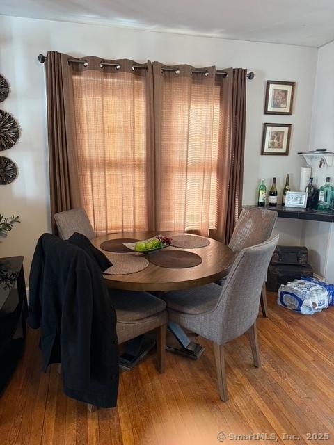 dining room with wood finished floors