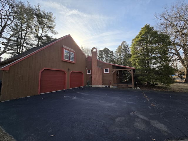 garage featuring driveway