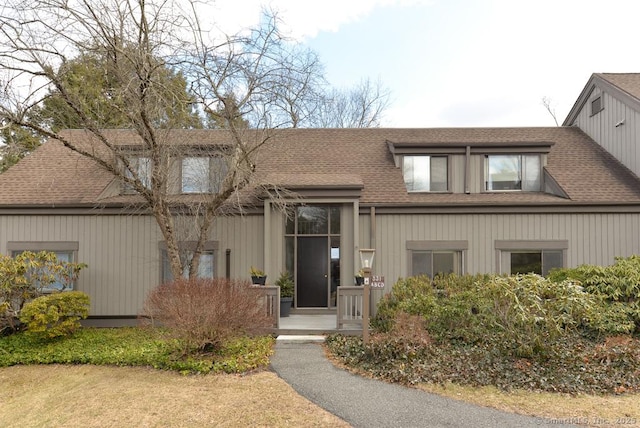 view of front of house featuring a shingled roof