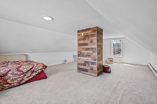 bedroom with baseboards, lofted ceiling, and carpet flooring