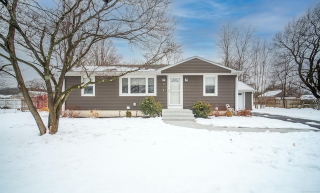 view of front of home with fence