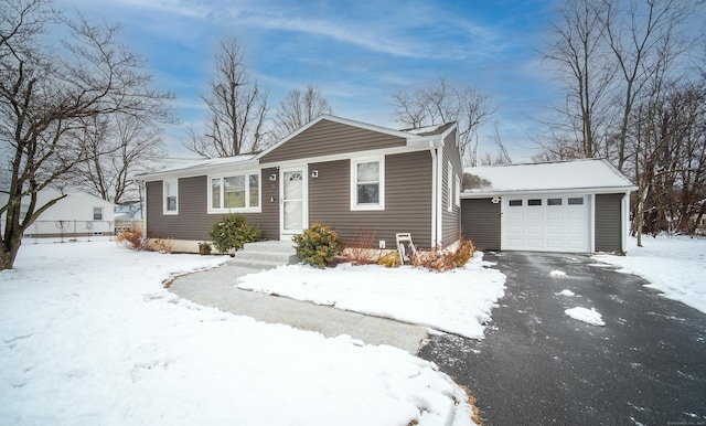 view of front of house featuring driveway and an attached garage