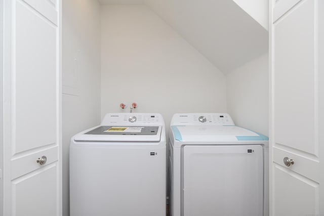 laundry area with laundry area and washing machine and clothes dryer