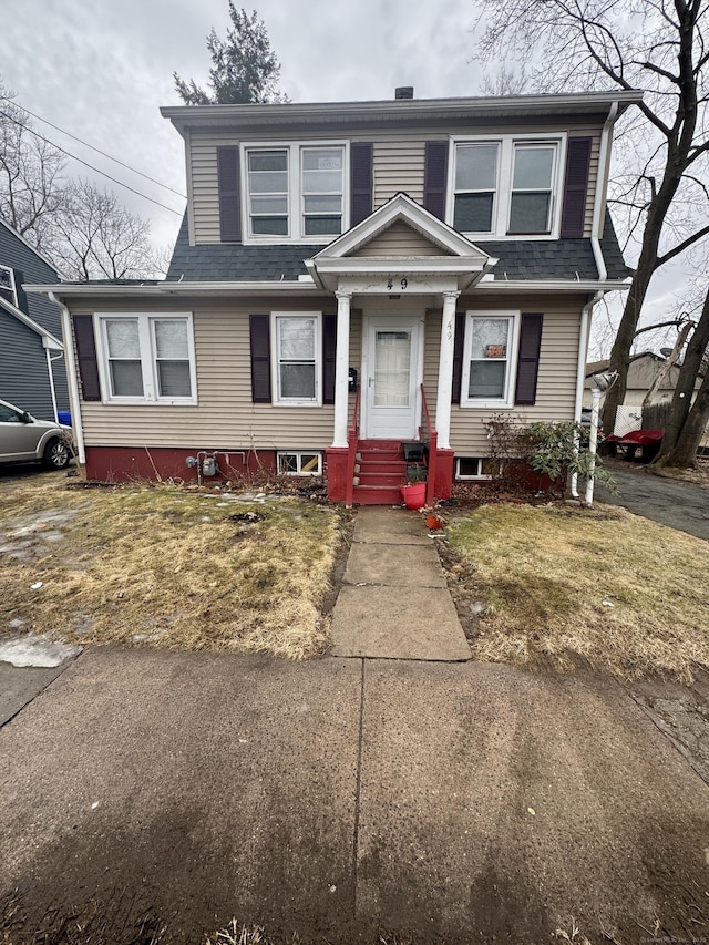 view of front of home with roof with shingles